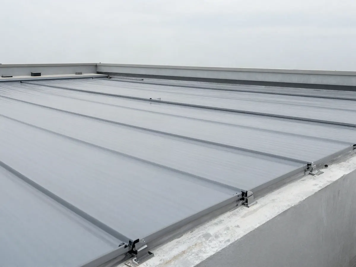 Flat commercial rooftop with grey membrane roofing
